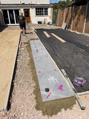Another client gets ready to enjoy her spectacular garden refurbishment
